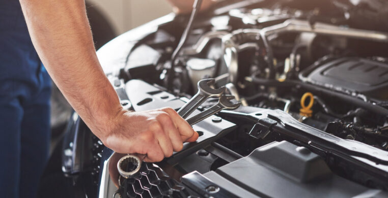Tony's Auto -car-service-worker-repairing-vehicle Tony's Auto -car-service-worker-repairing-vehicle
